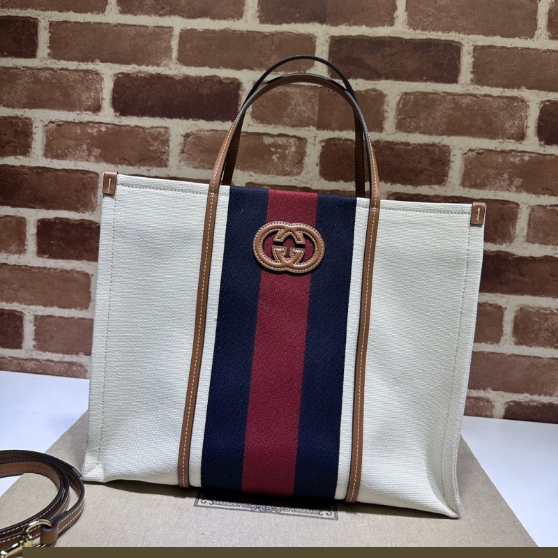 G*u*i shopping bags